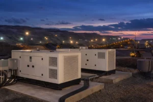 Enclosed generator sets supporting an open-pit mining operation at dusk
